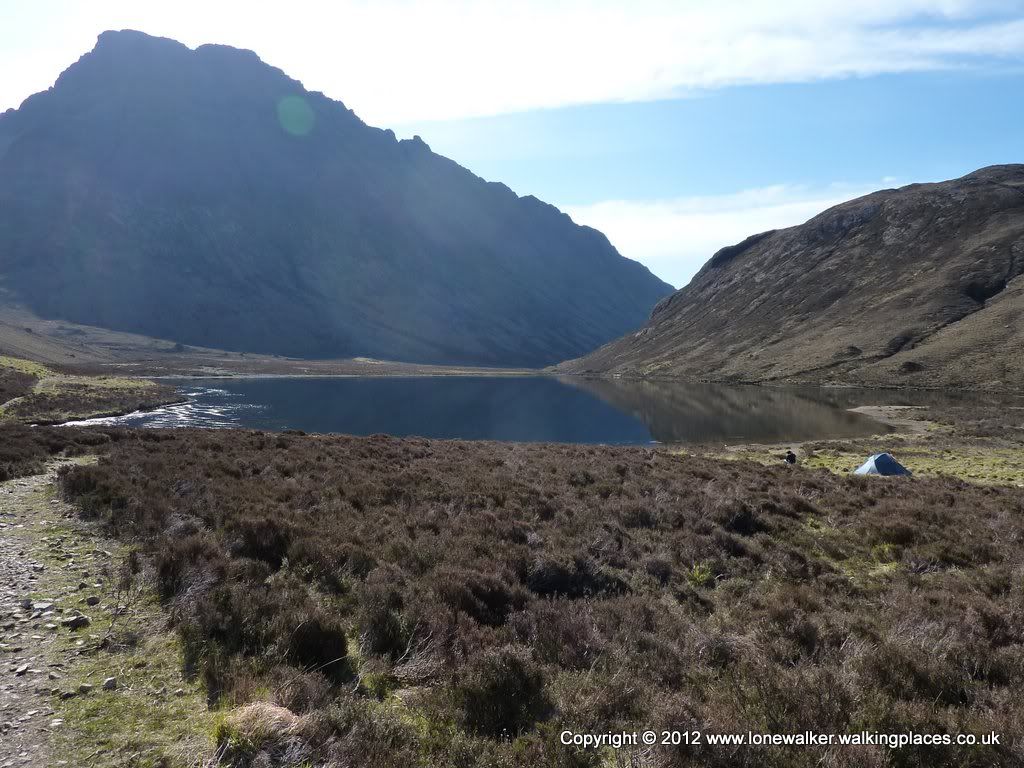 Loch an Athain with a pair of wild campers in the most amazing location